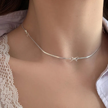 vzyzv  -  Korean Fashion Hollow Out Metallic Bowknot Pendant Necklaces for Women Girls Silver Plated Wide Flat Herribone Chokers