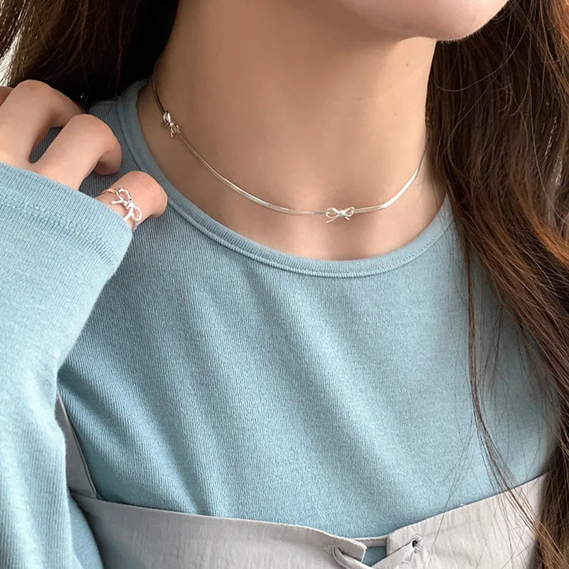 vzyzv  -  Korean Fashion Hollow Out Metallic Bowknot Pendant Necklaces for Women Girls Silver Plated Wide Flat Herribone Chokers